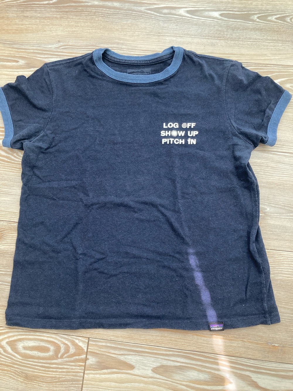 Patagonia Navy Tee with Light Blue Trim and White Chest Text Size Small
